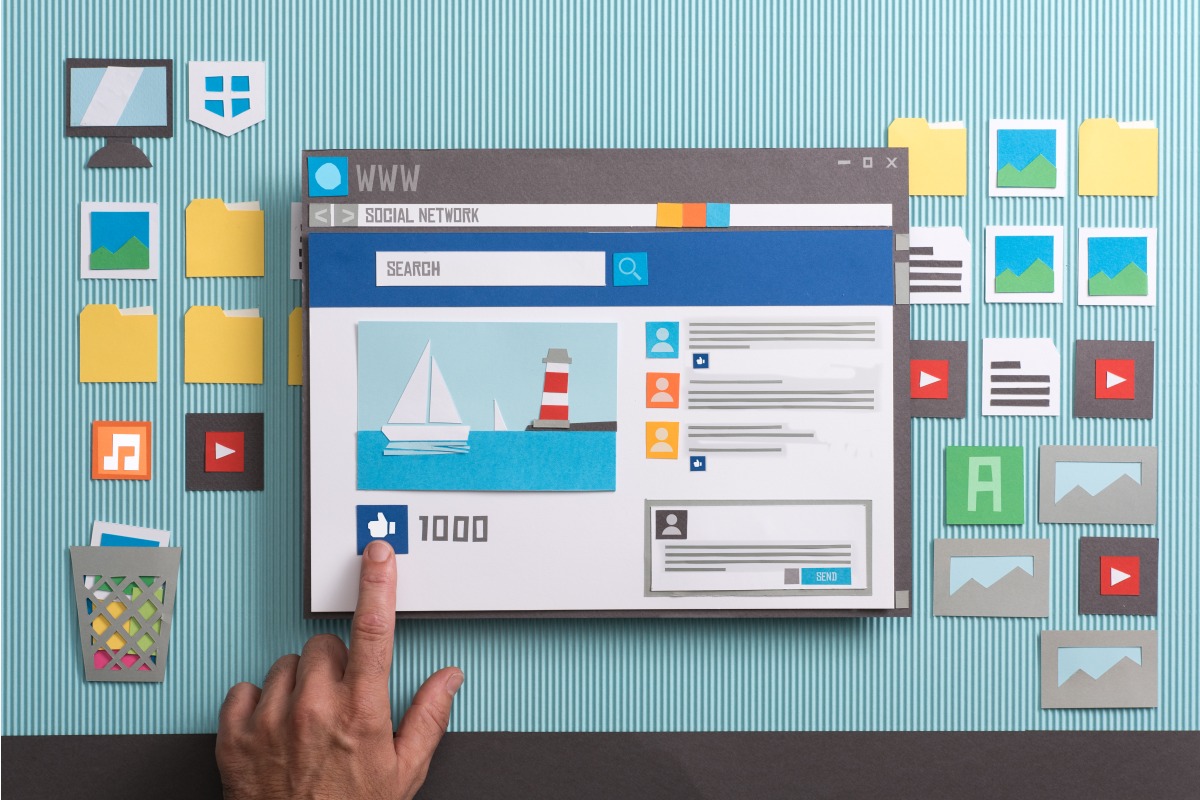 finger pointing at a mock web screen
